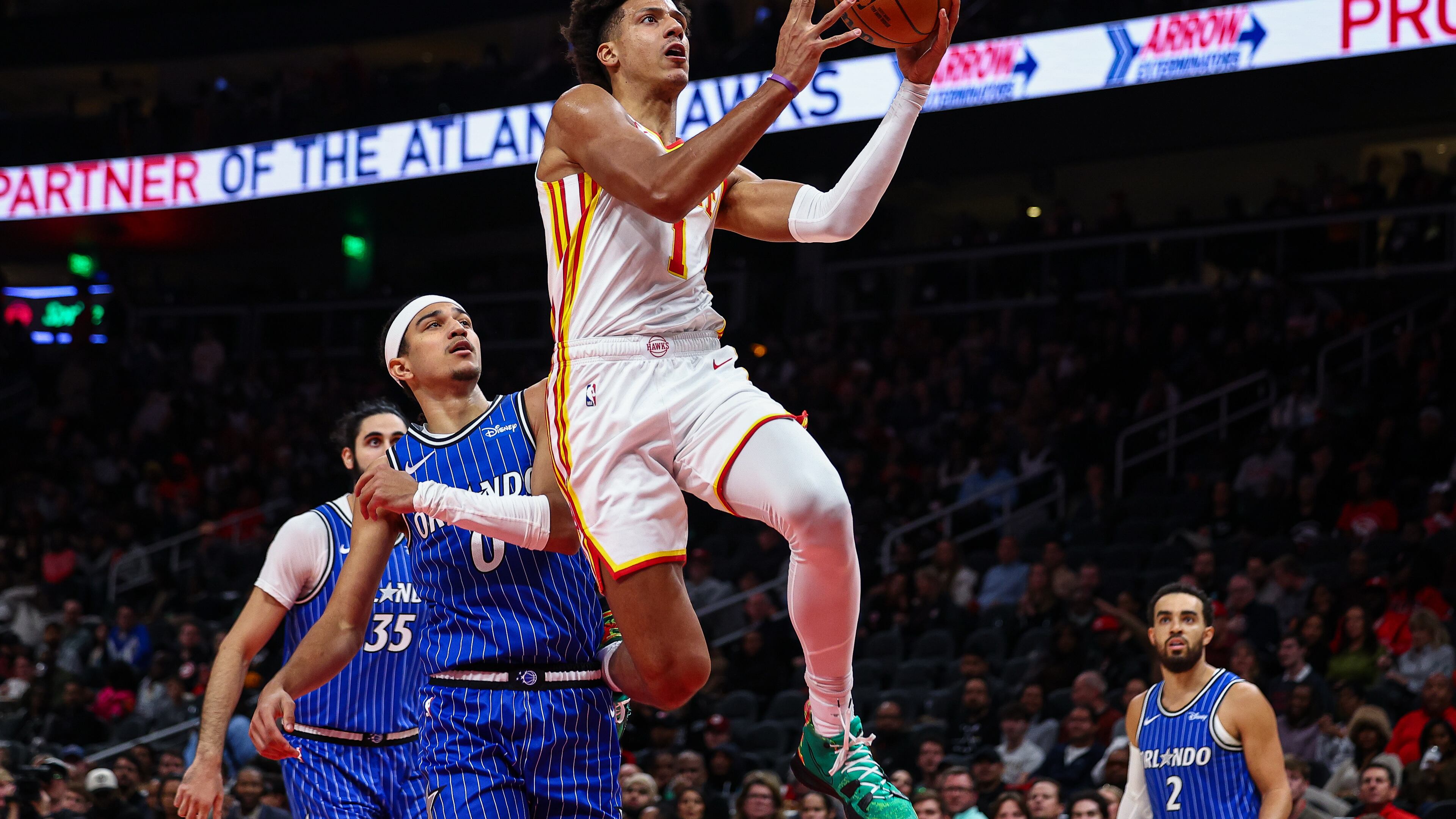 Atlanta Hawks forward Jalen Johnson (1) shoots the ball during the first half of an NBA basketball game against the Orlando Magic, Tuesday, Nov. 4, 2025, in Atlanta. (AP Photo/Colin Hubbard)