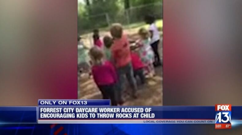 A teacher was filmed encouraging students to throw rocks at another child. (Photo: Screengrab via Fox13Memphis.com)
