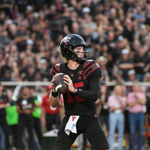 Texas Tech quarterback Will Hammond drops back to throw the ball against Houston during the first half of an NCAA college football game Friday, Sept. 18, 2026, in Lubbock, Texas. (AP Photo/Justin Rex)