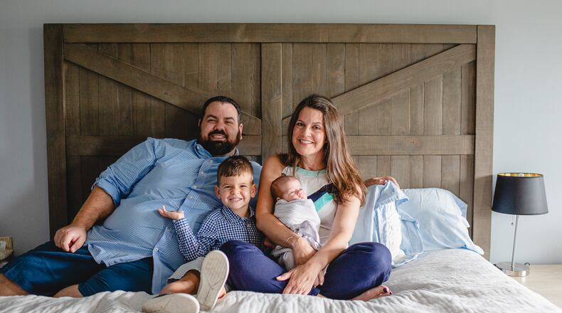 Sabrina and her family were finally able to take newborn photos with Harrison on May 16. The only outward signs of her illness are a tracheostomy scar on her neck and a left eye that’s droopier 
than the right.