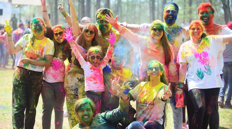 Enjoy throwing nontoxic colors — and having them thrown at you — during Dunwoody’s Holi festival. (Courtesy of Boon Vong)