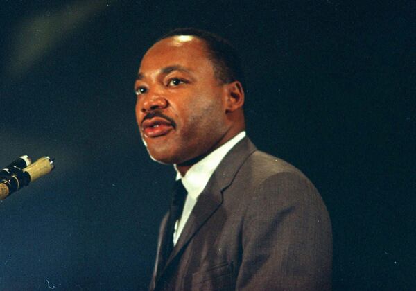 Dr. Martin Luther King speaks March 25, 1967, at the Chicago peace march.