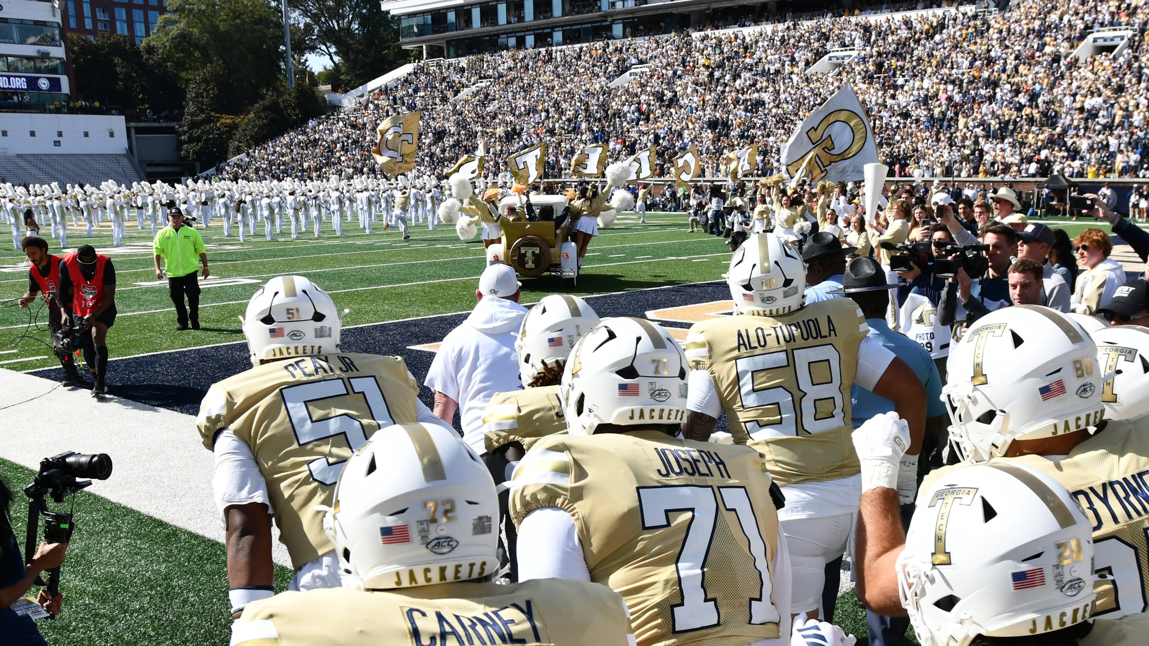 Georgia Tech’s Ramblin’ Wreck leads players and coaches onto the field before their game against Syracuse at Bobby Dodd Stadium on Saturday, Oct. 25, 2025, in Atlanta. This week the Yellow Jackets play NC State. (Hyosub Shin/AJC)