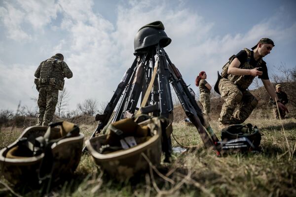 In this provided by Ukraine's 24th Mechanized Brigade press service, servicemen of 3rd mechanized battalion, practice on the training ground at an undisclosed location in the east of Ukraine, Thursday, March 27, 2025. (Oleg Petrasiuk/Ukraine's 24th Mechanized Brigade via AP)