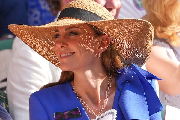 Britain's Kate, Princess of Wales, watches Jannik Sinner of Italy and Carlos Alcaraz of Spain during their men's singles final match at the Wimbledon Tennis Championships in London, Sunday, July 13, 2025.(AP Photo/Kirsty Wigglesworth)