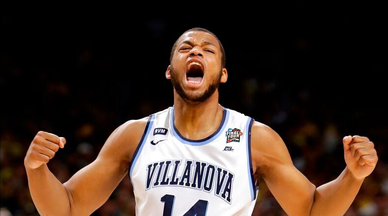 Villanova forward Omari Spellman celebrates during the first half against Kansas in the semifinals of the Final Four NCAA college basketball tournament, Saturday, March 31, 2018, in San Antonio. (AP Photo/Eric Gay)