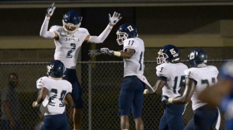 Senior WR Jadon Haselwood (2) celebrates his touchdown with the Saints in the second half of his game Friday, September 7, 2018 at McEachern High School . PHOTO/Daniel Varnado