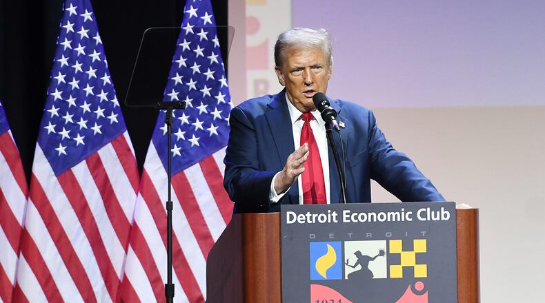 At an Oct. 10 speech at the Detroit Economic Club, Donald Trump touted a plan to revive the U.S. auto industry through aggressive tariffs on foreign imports, corporate tax cuts and a new tax write off for interest payments on car loans. (Clarence Tabb Jr./The Detroit News/TNS)