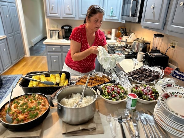 In this undated photo provided by her daughter, Mandonna "Donna" Kashanian, 64, prepares a meal. (Kaitlynn Milne via AP)