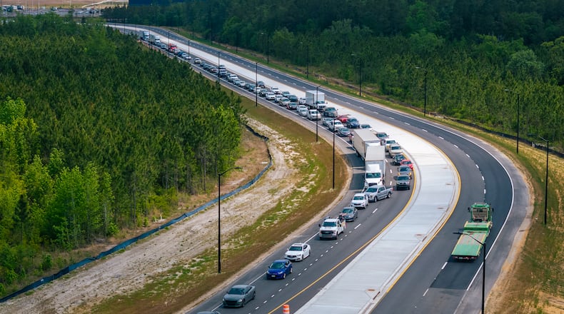 Traffic congestion on Genesis Dr. and U.S. Hwy 280 after a shift change at the Hyundai Metaplant in Bryan County, GA on April 23, 2025. (Justin Taylor for The Atlanta Journal-Constitution)