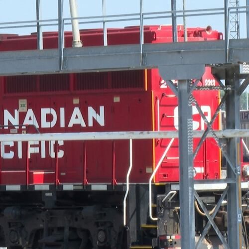FILE - A Canada Pacific (CPKC) train stopped in a railyard near the CPKC offices located in Kansas City, Mo., Aug. 19, 2024. (AP Photo/Nick Ingram, File)