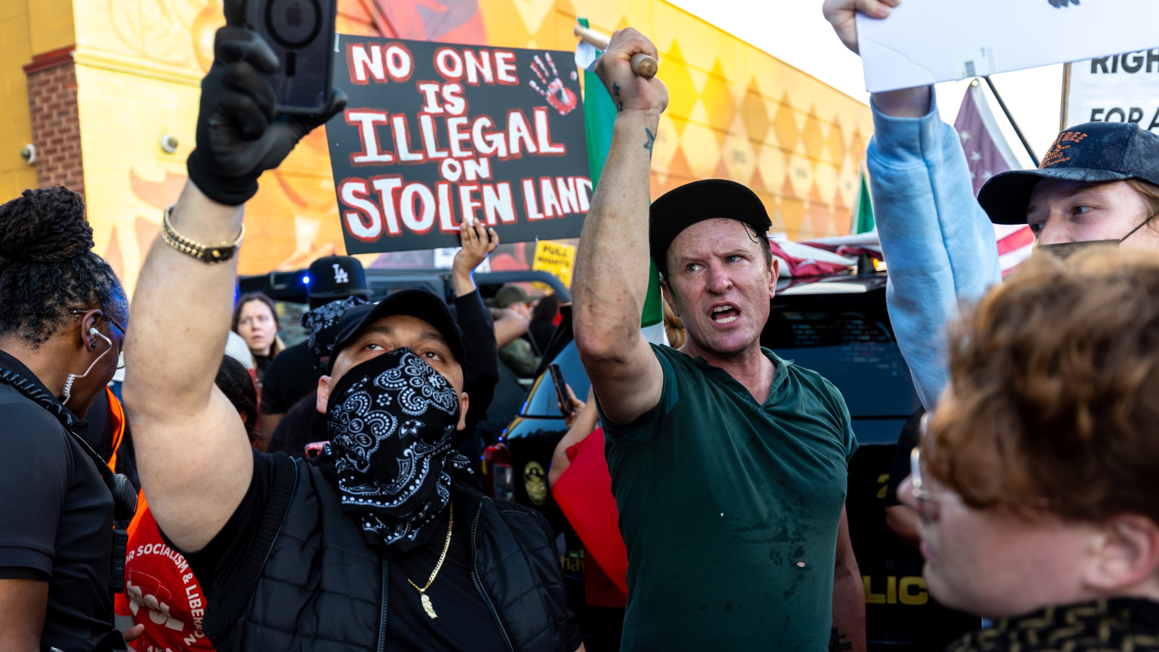 Demonstrators demanded to be able to march in the streets during a protest against ICE raids and deportations on Buford Highway on Tuesday. (Arvin Temkar / AJC)