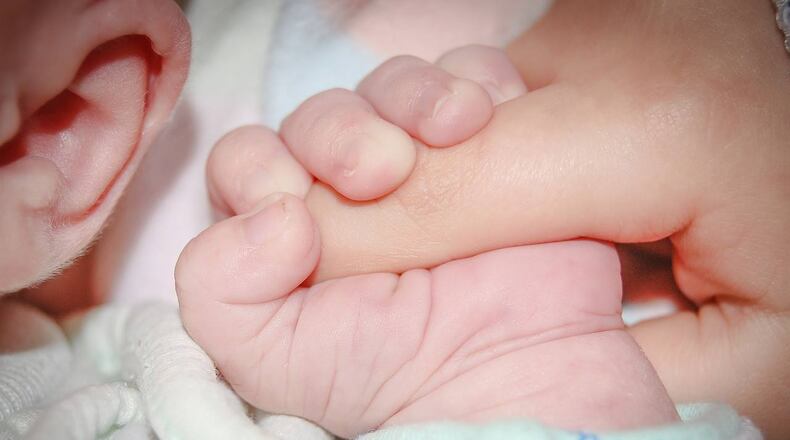Detroit firefighters worked quickly to save a newborn that did not have a pulse.