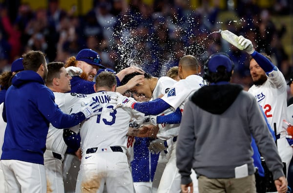 Shohei Ohtani and his Dodgers teammates celebrate their April 2 walk-off win against the Braves.