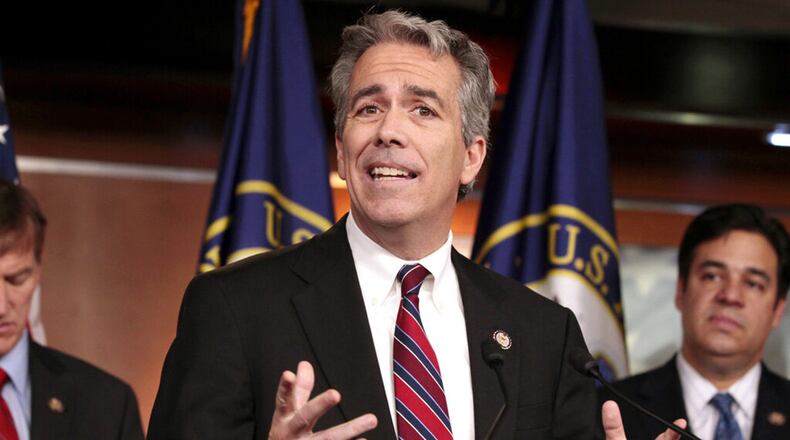 In this Nov. 15, 2011, file photo former U.S. Rep. Joe Walsh, R-Ill., gestures during a news conference on Capitol Hill in Washington. Walsh says he'll challenge President Donald Trump for the Republican nomination in 2020.