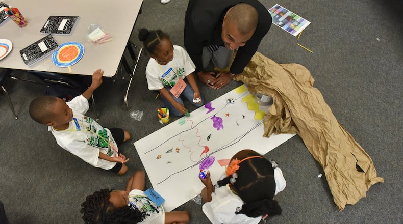June 13, 2018 Jonesboro - Clayton Schools Superintendent Morcease J. Beasley visits students and staff at Camp Invention, a STEM summer camp, at Callaway Elementary School in Jonesboro on Wednesday, June 13, 2018. HYOSUB SHIN / HSHIN@AJC.COM