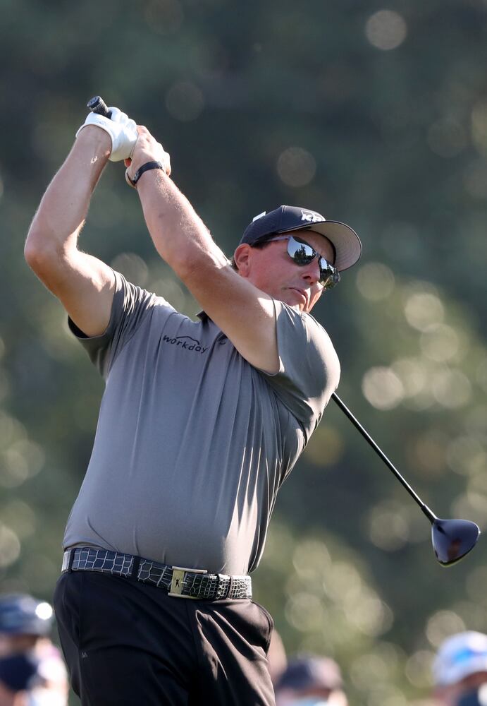 April 7, 2021, Augusta: Phil Mickelson hits his tee shot on the tenth hole during his practice round for the Masters at Augusta National Golf Club on Wednesday, April 7, 2021, in Augusta. Curtis Compton/ccompton@ajc.com