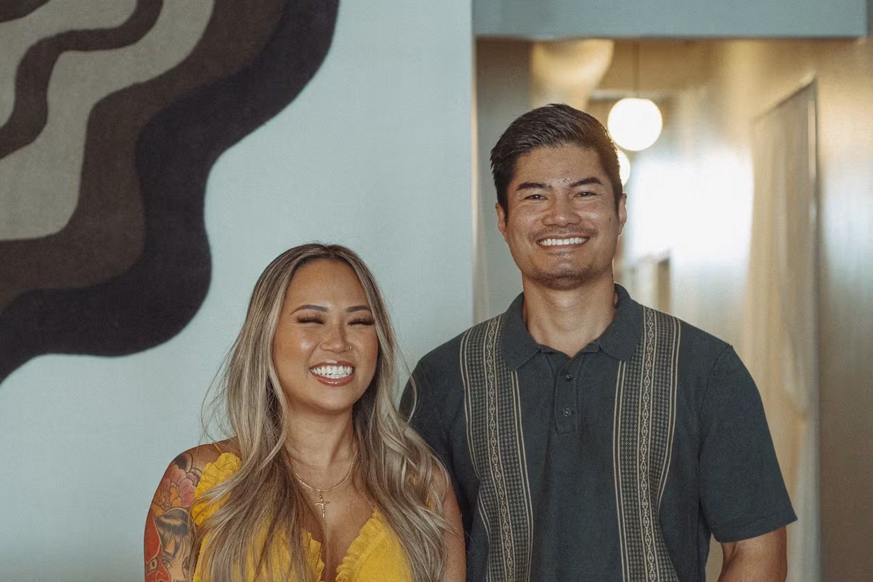 Side Quest’s Cynthia Hoang and Nik Soukavong standing together.