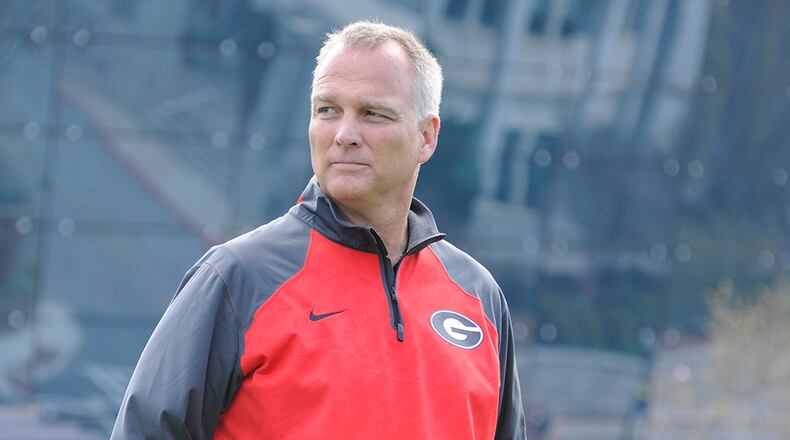 Coach Mark Richt can't offer recruits as much extra money as the SEC's other top football coaches. (Photo by John Kelley)