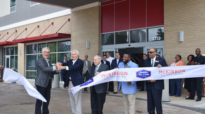 From left to right: John McKibbon, McKibbon Hospitality; John W. Lundeen III, Coro Realty Advisors; Sam Massell, Buckhead Coalition; Christopher Flanders, Hampton Inn & Suites Atlanta Buckhead; Marcus Margerum, Atlanta Convention and Visitors Bureau.