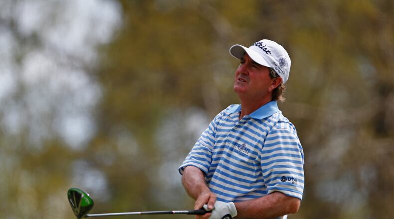 Gene Sauers inspects a tee shot during a PGA Tour Champions event in Mississippi last month. (Matt Sullivan/Getty Images)