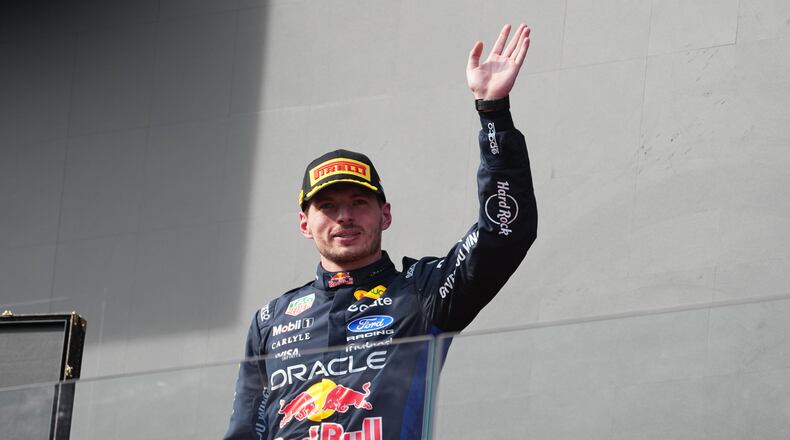 Second placed Red Bull driver Max Verstappen of the Netherlands waves after the Formula One Hungarian Grand Prix auto race, at the Hungaroring racetrack in Mogyorod, near Budapest, Hungary, Sunday, July 26, 2026. (AP Photo/Darko Vojinovic)