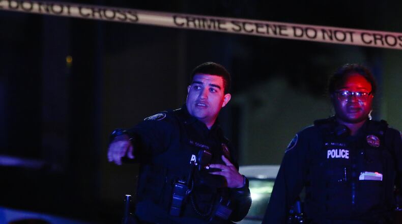 Crime scene tape was across the parking lot of the Gateway at Hartsfield Apartments on Garden Walk Boulevard on June 18, 2019. A contractor was shot and killed at the complex, according to Clayton County police.