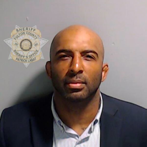 In this handout provided by the Fulton County Sheriff's Office, leader of Black Voices for Trump Harrison Floyd poses for his booking photo on Aug. 24, 2023, in Atlanta. (Fulton County Sheriff's Office via Getty Images/TNS)