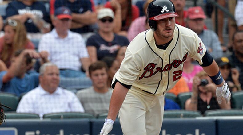 July 13, 2013 Atlanta - Atlanta Braves right fielder Joey Terdoslavich (25) hits doubles in the 5th inning against the Cincinnati Reds at Turner Field in Atlanta on Saturday, July 13, 2013. HYOSUB SHIN / HSHIN@AJC.COM Joey Terdoslavich is off to a strong start in Grapefruit League play after working to shorten his swing and get back to hitting the ball to the opposite field. (AJC file photo)