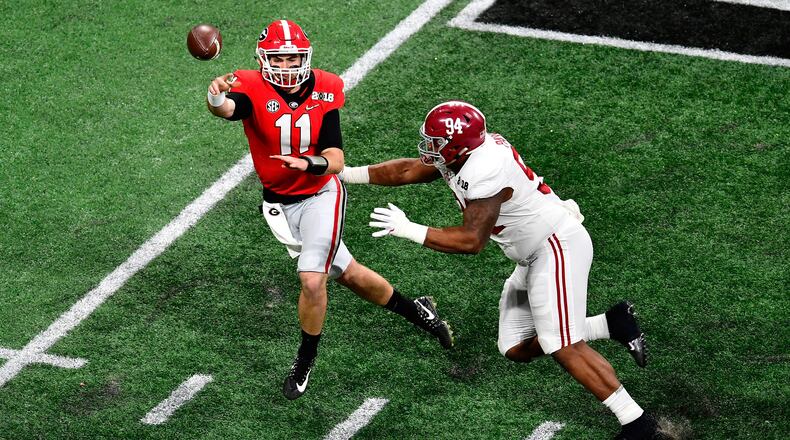 Former Alabama defensive lineman Da’Ron Payne, here pressuring Georgia quarterback Jake Fromm in the college football national championship game in January at Mercedes-Benz Stadium, is among the defensive tackles who could help the Falcons.
