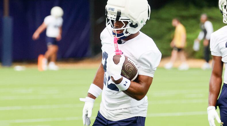 Georgia Tech running back Justice Haynes runs drills during the first day of football practice at Rose Bowl Field and the Mary and John Brock Football Practice Facility on Monday, Aug. 3, 2026, in Atlanta. (Miguel Martinez/AJC)