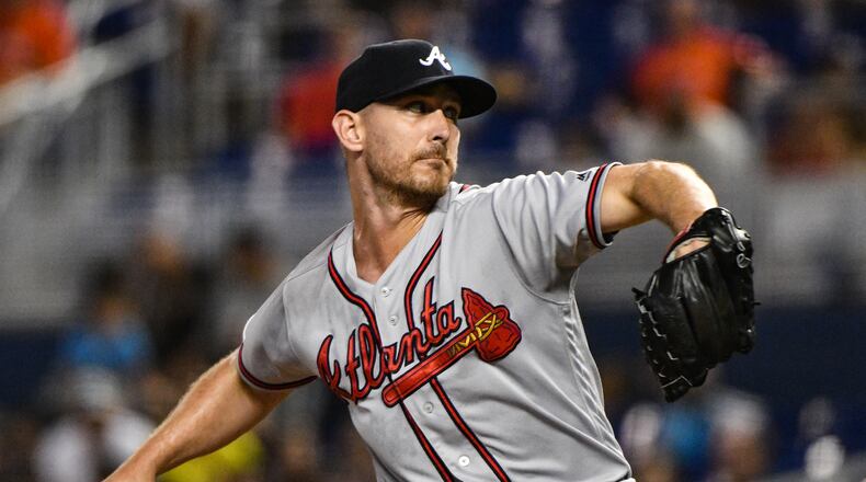 Josh Tomlin, in the process of getting his first career save against Marlins Sunday. (Photo by Mark Brown/Getty Images)