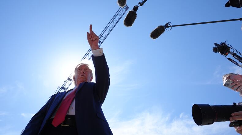 President Donald Trump speaks as he tours Ballroom construction around the outside the White House, Tuesday, May 19, 2026, in Washington. (AP Photo/Jacquelyn Martin)