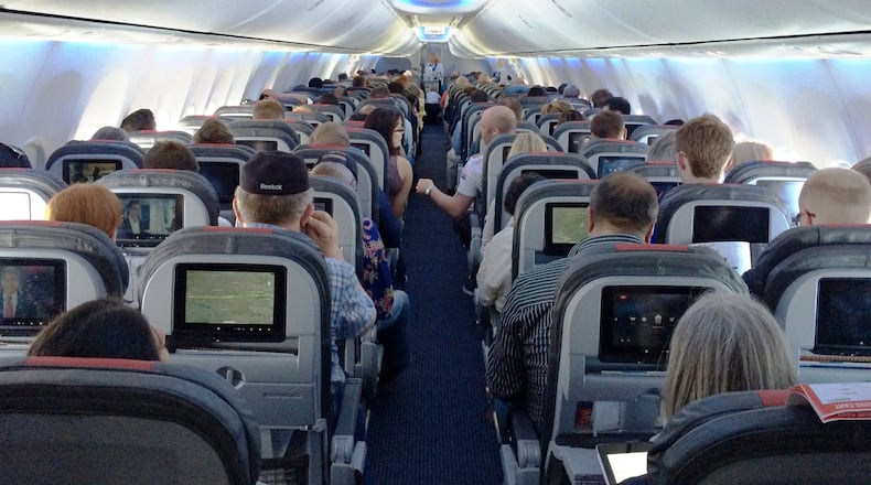 One of American Airlines' new 737s. The cabin gives standard economy passengers less space, but also an entertainment system to distract them. (Josh Noel/Chicago Tribune/MCT)