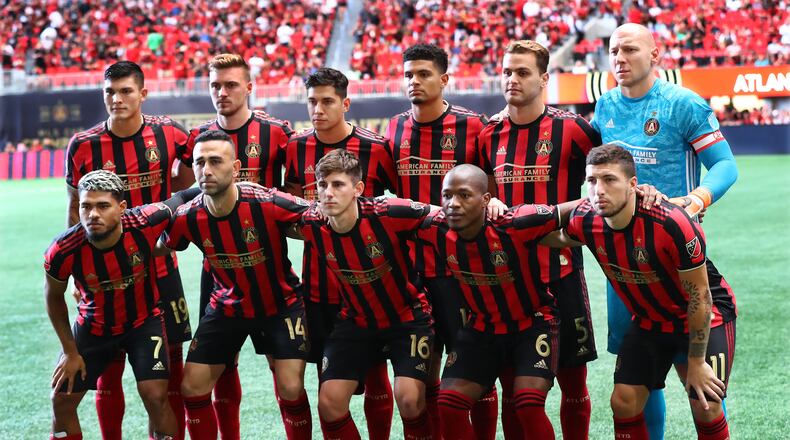 July 21, 2019 Atlanta: Atlanta United starters pose for a team photo taking the field to play D.C. United in a soccer match on Sunday, July 21, 2019, in Atlanta.   Curtis Compton/ccompton@ajc.com
