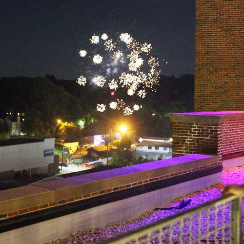 Customers view fireworks from atop the Ponce City Market on Friday, July 4, 2025. (Zaire Breedlove/AJC)