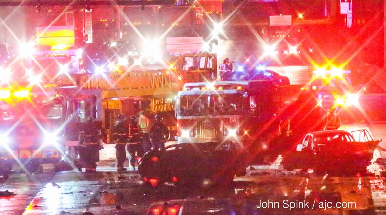 A deadly  multi-vehicle crash blocked several lanes on I-20 near Hill Street on Monday morning. JOHN SPINK / JSPINK@AJC.COM
