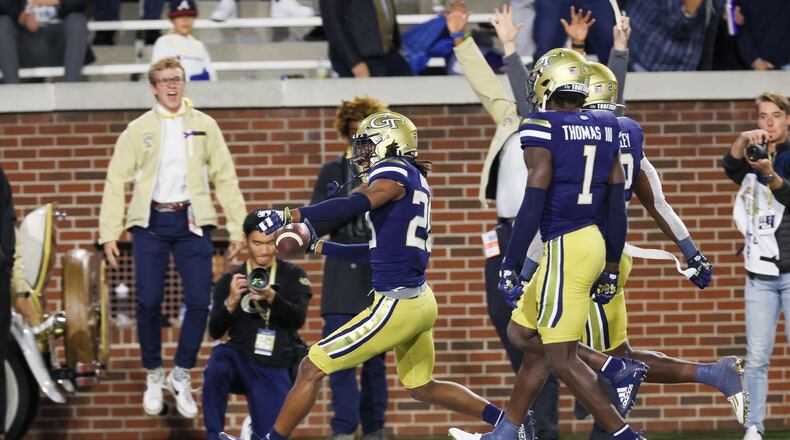 October 20, 2022 Atlanta - Georgia Tech safety LaMiles Brooks (20) scores a touchdown in the first half of the Georgia Tech versus Virginia NCAA college football game at Bobby Dodd stadium on Thursday, October 20, 2022. (Arvin Temkar / arvin.temkar@ajc.com)