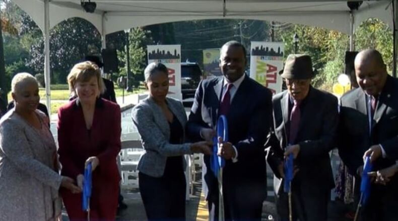 Mayor Kasim Reed along with Deputy Chief Operating Officer and Commissioner of the Department of Public Works William Johnson, Renew Atlanta and TSPLOST General Manager Faye DiMassimo, Atlanta City Councilmember C.T. Martin and the community celebrated the opening of the Lynhurst Drive Complete Street Project.