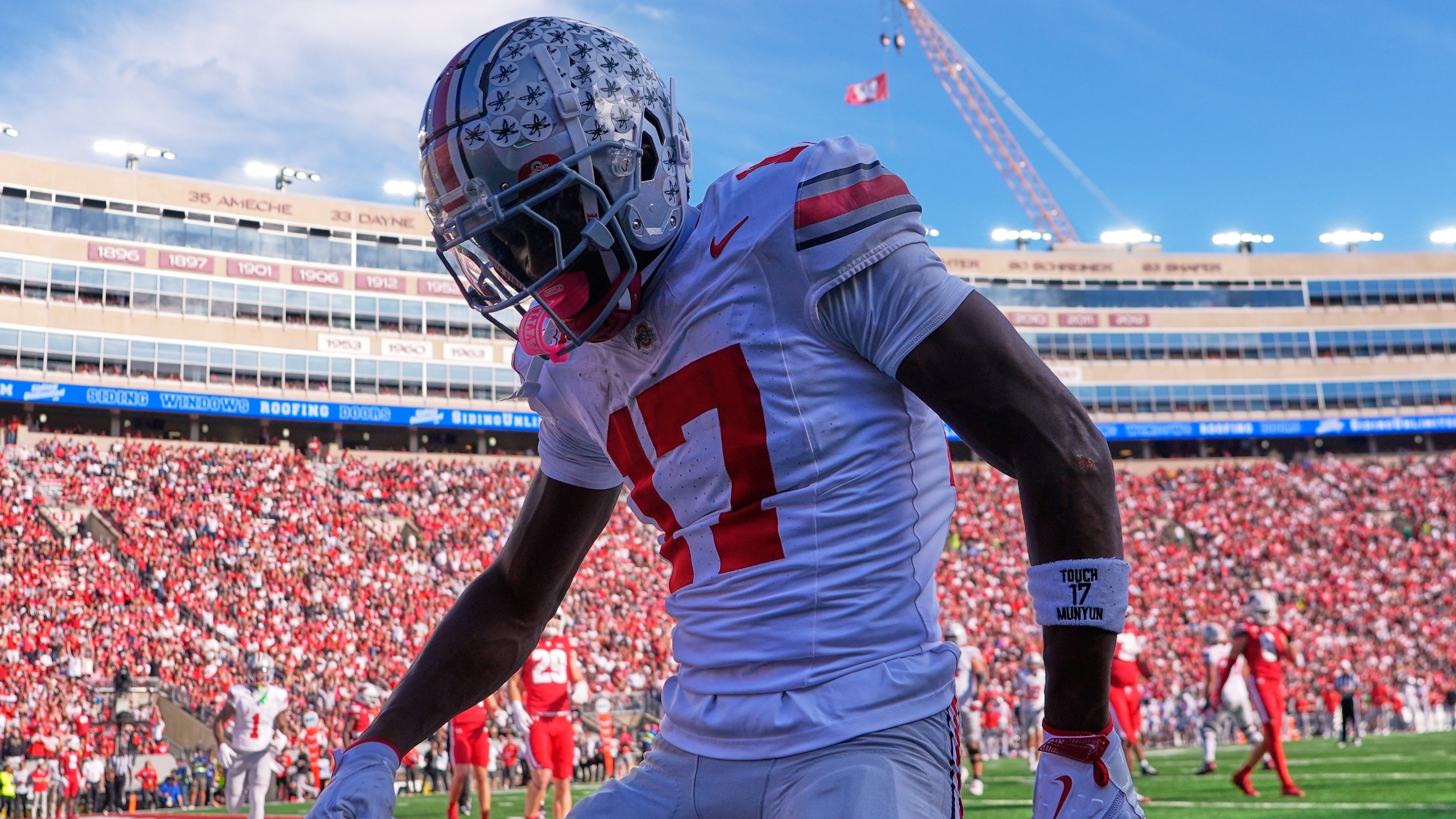 Ohio State's Carnell Tate celebrates his touchdown catch during the first half of an NCAA college football game against the Wisconsin Saturday, Oct. 18, 2025, in Madison, Wis. (AP Photo/Morry Gash)