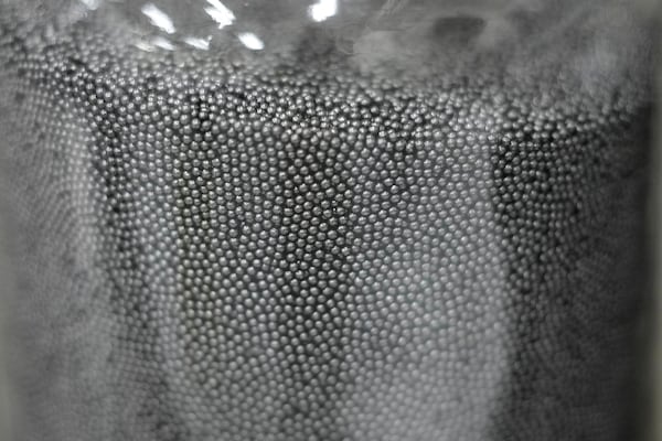 Uranium kernels wrapped in three alternating layers of pyrolytic carbon and silicon carbide used for the manufacture of TRISO fuel are visible on Friday, June 27, 2025, in Oak Ridge, Tenn. (AP Photo/George Walker IV)