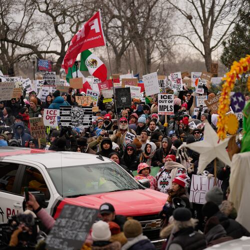 Protesters gather during a rally for Renee Good, who was fatally shot by an ICE officer earlier in the week, Saturday, Jan. 10, 2026, in Minneapolis. (AP Photo/John Locher)