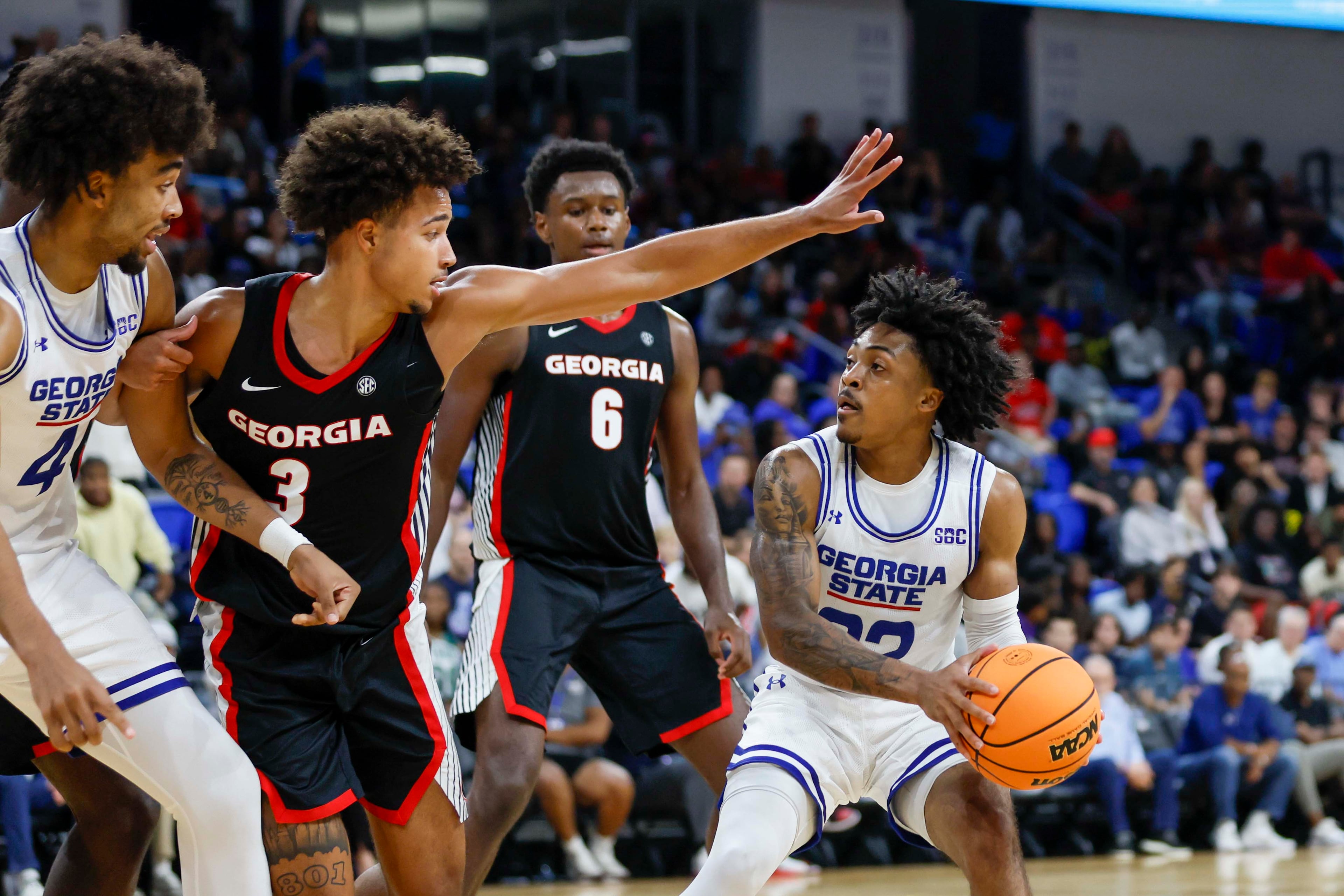 Georgia State Panthers guard Malachi Brown (22) dribbles against Georgia Bulldogs guard Jordan Ross (3) during the second half of an exhibition opener game at the Georgia State Convocation Center, Wednesday, October 15, 2025, in Atlanta.
(Miguel Martinez/ AJC)