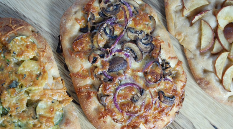 Pinsa Romana pizza hails from Rome, and is an easy-to-make, versatile flatbread for sweet and savory toppings. / Meridith Ford for the AJC