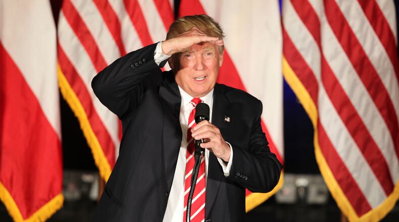 Donald Trump peers into the crowd at the Fox Theatre on Wednesday afternoon at a rally in downtown Atlanta. Emily Jenkins, ejenkins@ajc.com