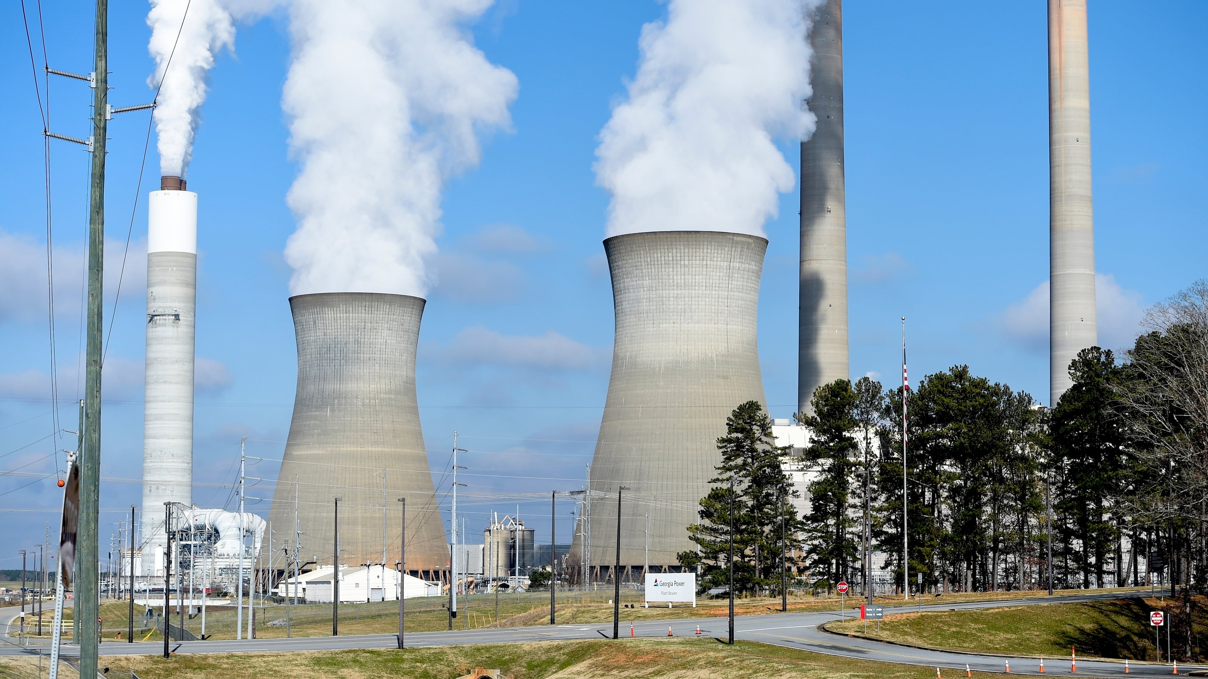 FILE - Plant Bowen, commonly known as Bowen Steam Plant, is a Coal power station, operating, Monday, Dec. 14, 2020, in Euharlee, Ga. (AP Photo/Mike Stewart, File)