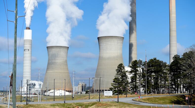 FILE - Plant Bowen, commonly known as Bowen Steam Plant, is a Coal power station, operating, Monday, Dec. 14, 2020, in Euharlee, Ga. (AP Photo/Mike Stewart, File)