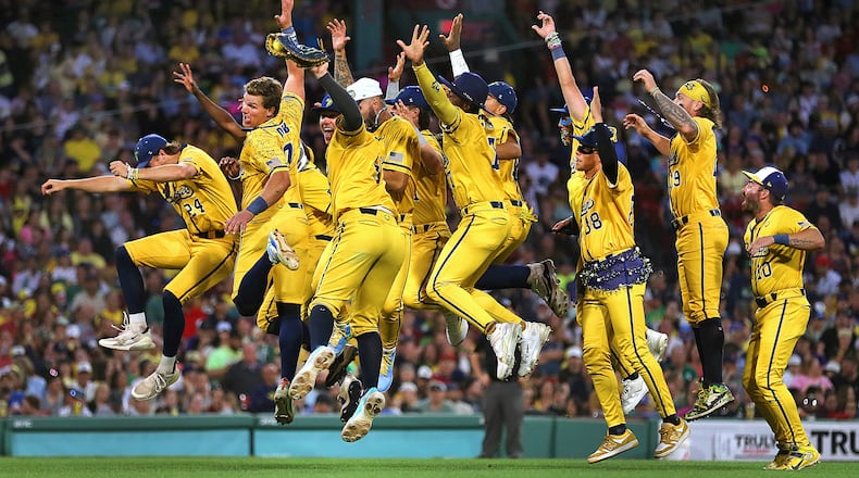 The Savannah Bananas celebrate a run in the 6th inning. The Savannah Bananas took their World Tour to a sold-out Fenway Park on Saturday, June 8, 2024, as they played the Party Animals before over 37,000 fans in Boston. (John Tlumacki/The Boston Globe)