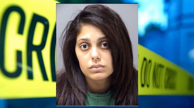 Maria Elena Sullivan was arrested on murder and child abuse charges.