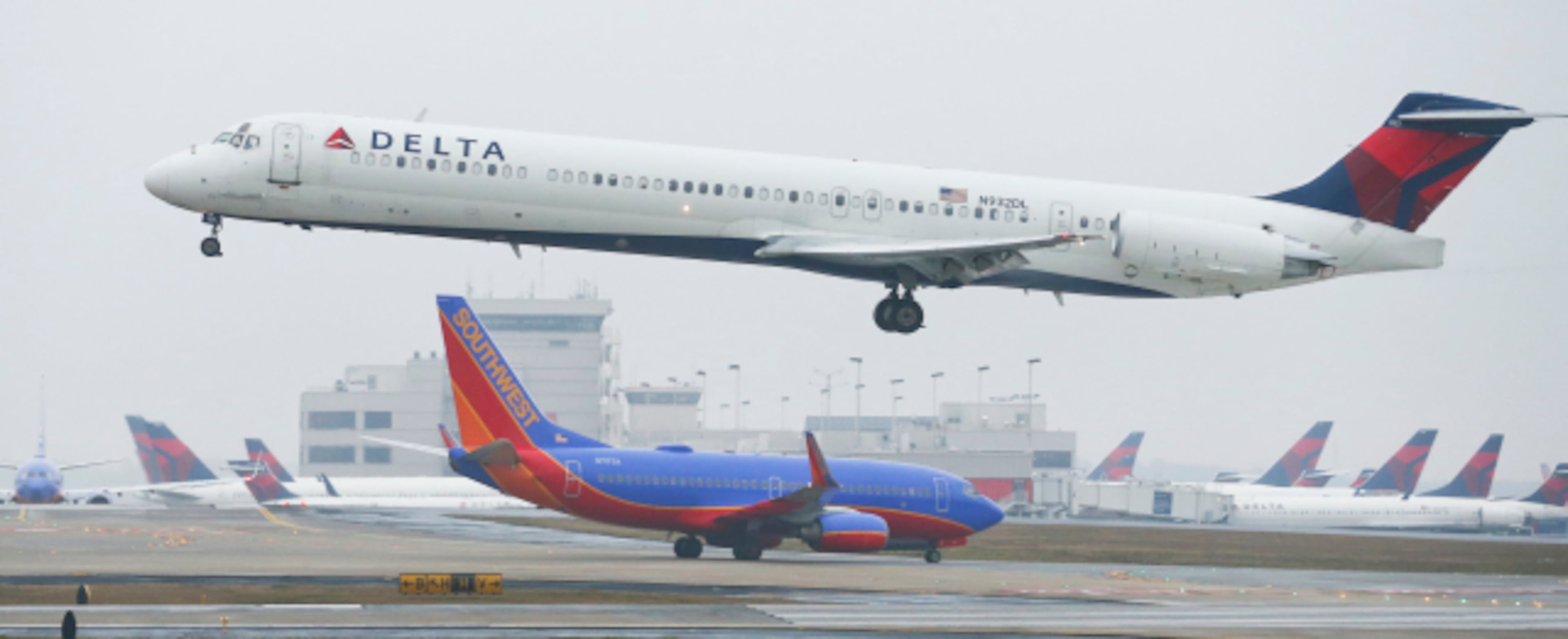 A Delta jet takes off in 2015. Southwest acquired AirTran's Atlanta hub in 2011. Its CEO said it would never have been able to gain a foothold in the market without the acquisition, given Delta's dominance. (AJC 2015)